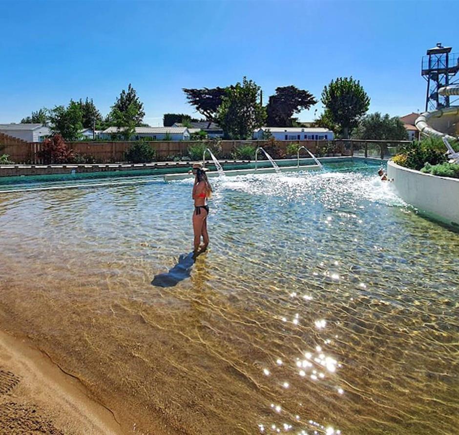 sandy lagoon with spa - Camping pomme de pin